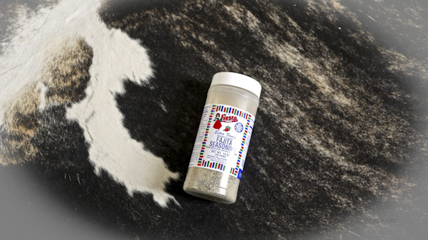 Authentic Texan Fajita flavoring mix, lovingly floating over an authentic Texas Longhorn hide
