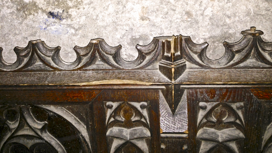 carved panels resting rendomly against walls