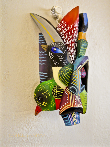 A more contemporary style of Boruca carving incorporating eco features, often frogs or birds. Mask by Catalina & Roy Lázaro Morales